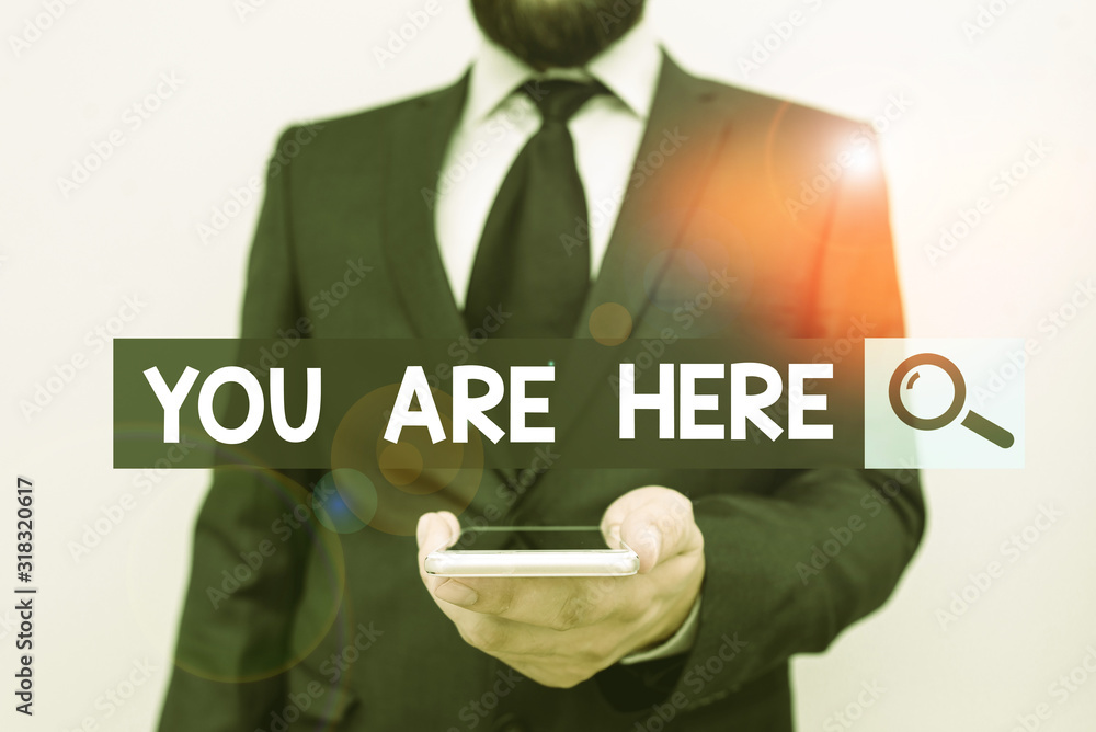 Poster writing note showing you are here. business concept for this is your location reference point global