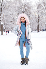 Fototapeta na wymiar Fashion young girl in the winter time