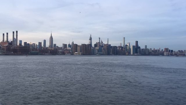 New York midtown Manhattan view across Hudson river showing skyline buildings Empire state building stock footage  