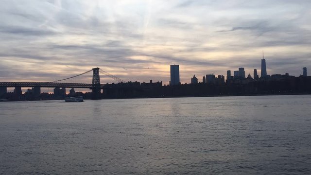 New York, USA - 20/12/2019: View of downtown Manhattan New York skyline skyscrapers  from ferry approaching city. stock video clip timelapse