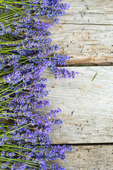 Obraz premium Bunch of Lavender on wooden background.