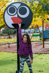 Little girl playing in park