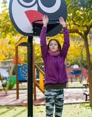 Little girl playing in park