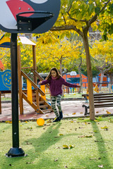 Little girl playing in park