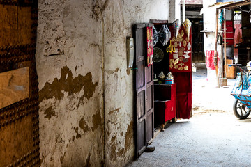 Fes, Morocco - 21,04, 2019: People walking in the street of the open-air market bazaar in Fez.