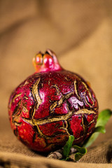 Fruit of pomegranate on a vintage cloth
