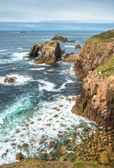 Enys Dodnan and the Armed Knight rock formations at Lands End, Cornwall, England, United Kingdom, Europe.