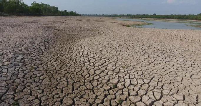 A dry lake bed with the natural surface of broken clay, deadly fields, concepts, concepts, symbols, ecology, natural disasters