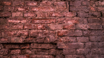 Old brick wall texture for background. Ancient building wall. Wall of destroyed buildings.