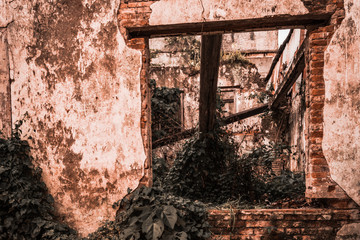 Fototapeta na wymiar Ruins of old destroyed building. Rustic building debris.