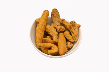 Dried turmeric on white isolated background