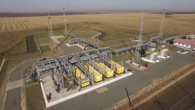 oil pumping station, view from air, aerial shooting in summer day
