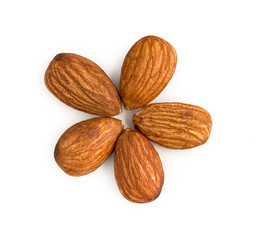Kernels of nuts almonds lying in the shape of a flower isolated on white background top view