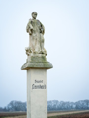 Fototapeta na wymiar Column with statue of saint leonhard in burgenland