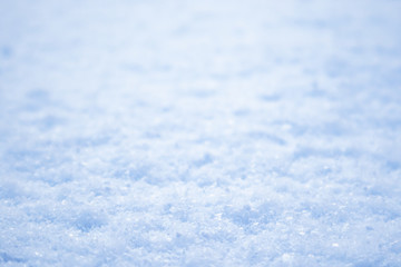 Obraz premium Bright white blue light snow macro winter texture