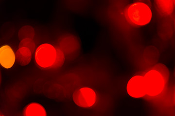 colorful twinkling bokeh lights background color red