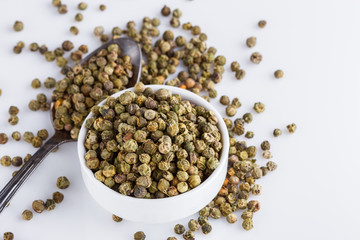 green peppers in bowl on white background