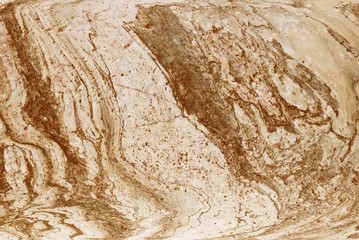 The plate is made of marble of brownish-white shades. Smooth texture for design and decoration. Natural building material. Natural patterns on the stone. Plates for floor and walls