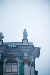 statues standing on the building