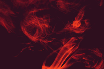 Fototapeta premium Fancy colored smoke. Curls and clouds of colored smoke.