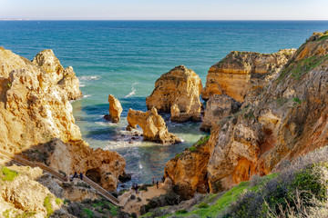 Aerial view of Ponta da Piedade in Lagos, Portugal. Cliff rocks and sea at Ponta da Piedade, Portugal.