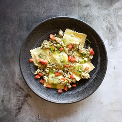 Spinach Ricotta Ravioli with Sausage and Tomatoes