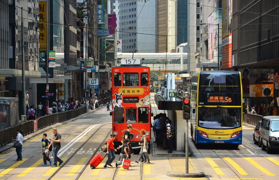 HONG KONG, CHINA - MARCH 28 : Hong Kong cityscape view with famous trams at Wan Chai district of Hong Kong