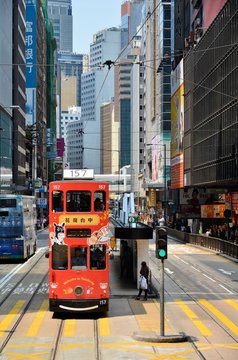 HONG KONG, CHINA - MARCH 28 : Hong Kong cityscape view with famous trams at Wan Chai district of Hong Kong