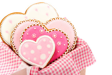 Set of pink heart shaped cookies with patterns, handmade, light background