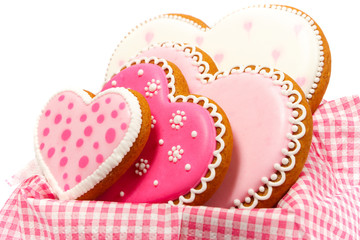Set of pink heart shaped cookies with patterns, handmade, light background