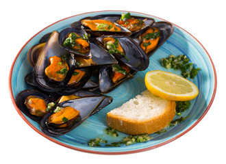 Fototapeta na wymiar Photography of plate with mussels under lemon sauce