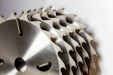 Carbide tipped saw blades for cutting wood closeup.