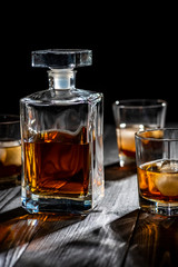 a glass of whiskey with ice