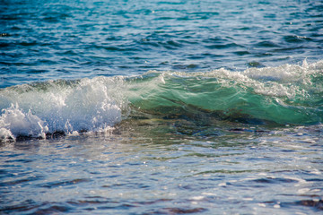 Transparency of sea water photographed in a wave