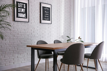 Modern dining room interior with stylish furniture