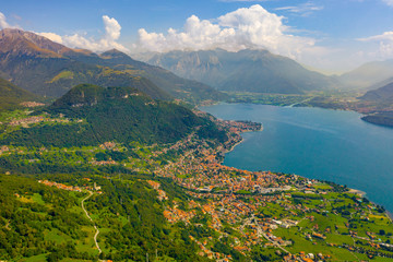Fototapeta na wymiar Lake Como with Alps Mountains on the Background. Travel Postcard Concept