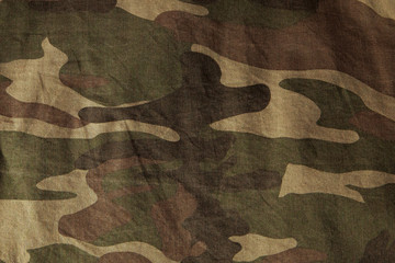 Closeup of military uniform surface. Texture of fabric, close-up, military coloring