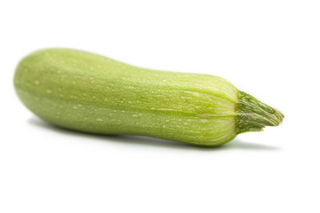fresh organic zucchini isolated on a white background