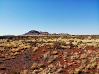 Rock in the middle of the red dessert in Australia