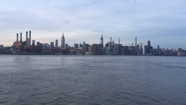 New York city skyline across river skyscrapers of downtown Manhattan stock footage video 