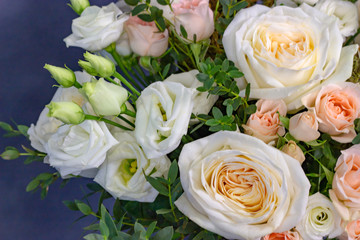 Fresh composition of bright flowers close-up work of florist decorative background