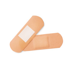Medical sticking plasters isolated on white. First aid item
