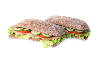 Tasty sandwiches with ham isolated on white