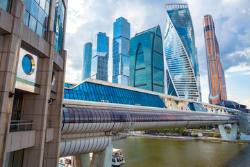 Moskva-city. Skyscrapers of glass and concrete. Glazed bridge over the river Moscow. Business card...