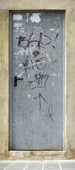 metal door with graffiti
