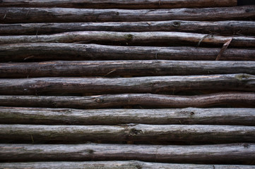 wall of dry even horizontal wooden sticks
