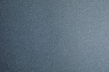 Blue sheet of cardboard as background, top view