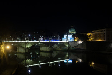 Fototapeta premium Night scene of Rome, Tevere river with basilica in background