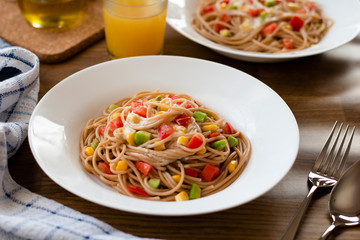 Delicious vegan pasta salad with tahini dressing. Noodles with quinoa or whole wheat pasta.