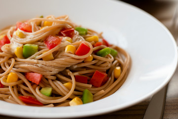 Delicious vegan pasta salad with tahini dressing. Noodles with quinoa or whole wheat pasta.